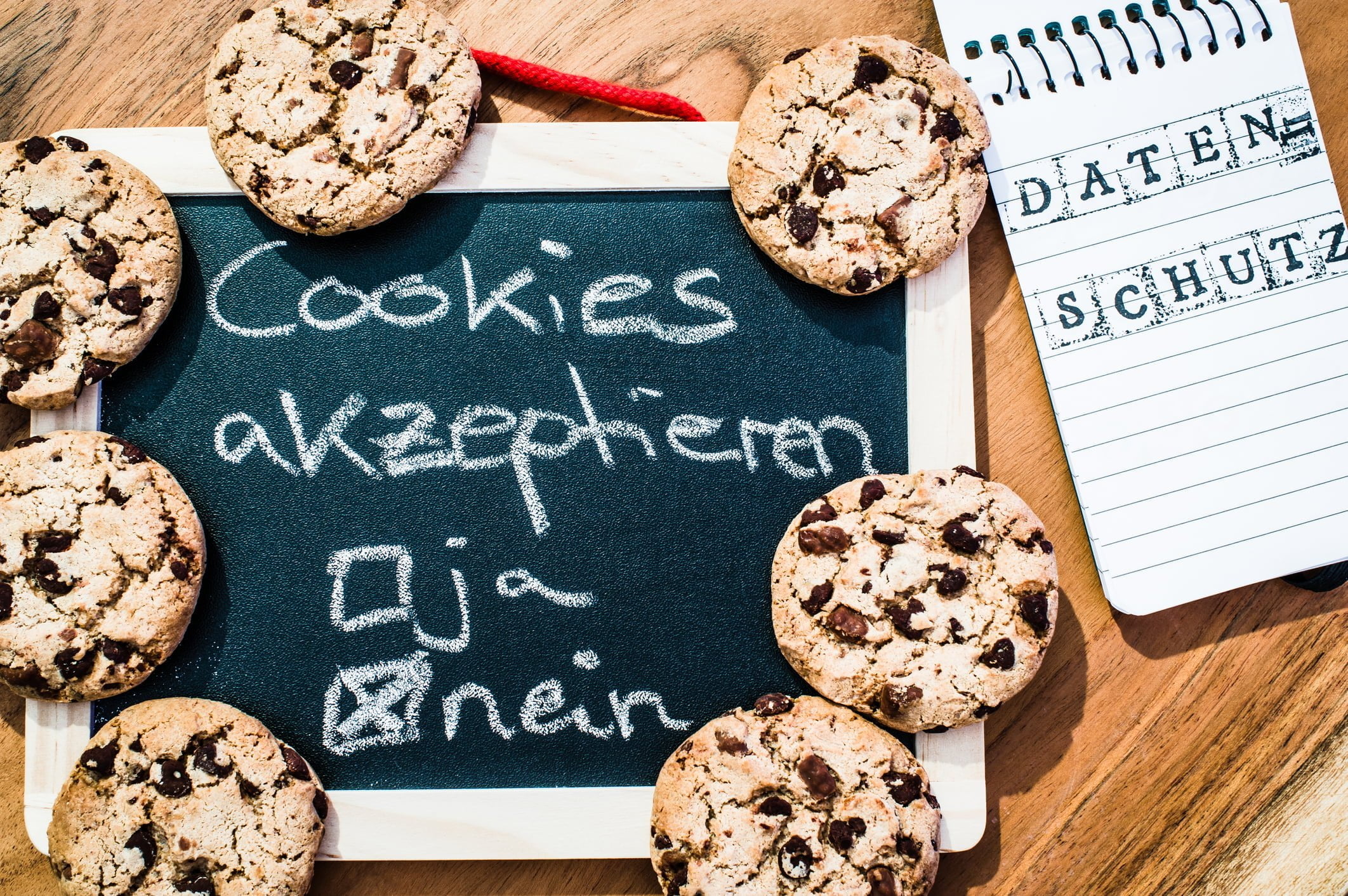 Cookies with a tablet to clarify cookie banners for websites with in German cookies accept yes no data protection in English Cookies acceepted yes no Privacy